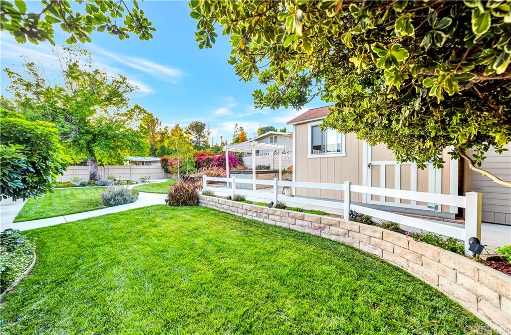 7078 Deveron Ridge Road West Hills, CA 91307 - Photo 8 of 62 a view of a house with a yard and sitting area
