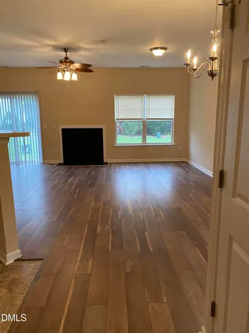 a front view of a house with a garage