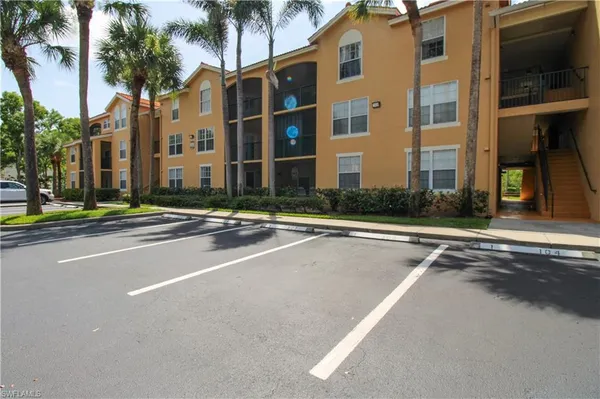 a front view of a building with street view