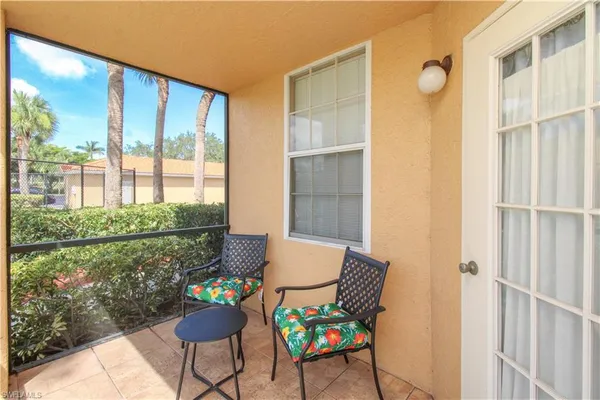 a room with furniture and a window