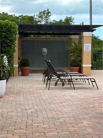 a view of a terrace with furniture