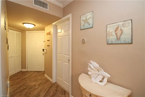 a bathroom with a toilet sink and shower