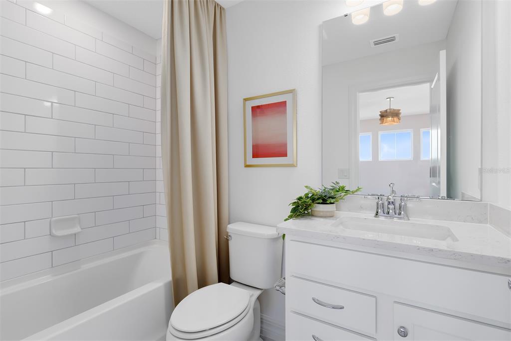 15130 Willow Ridge Drive Montverde, FL 34756 - Photo 22 of 27 a bathroom with a sink toilet and shower