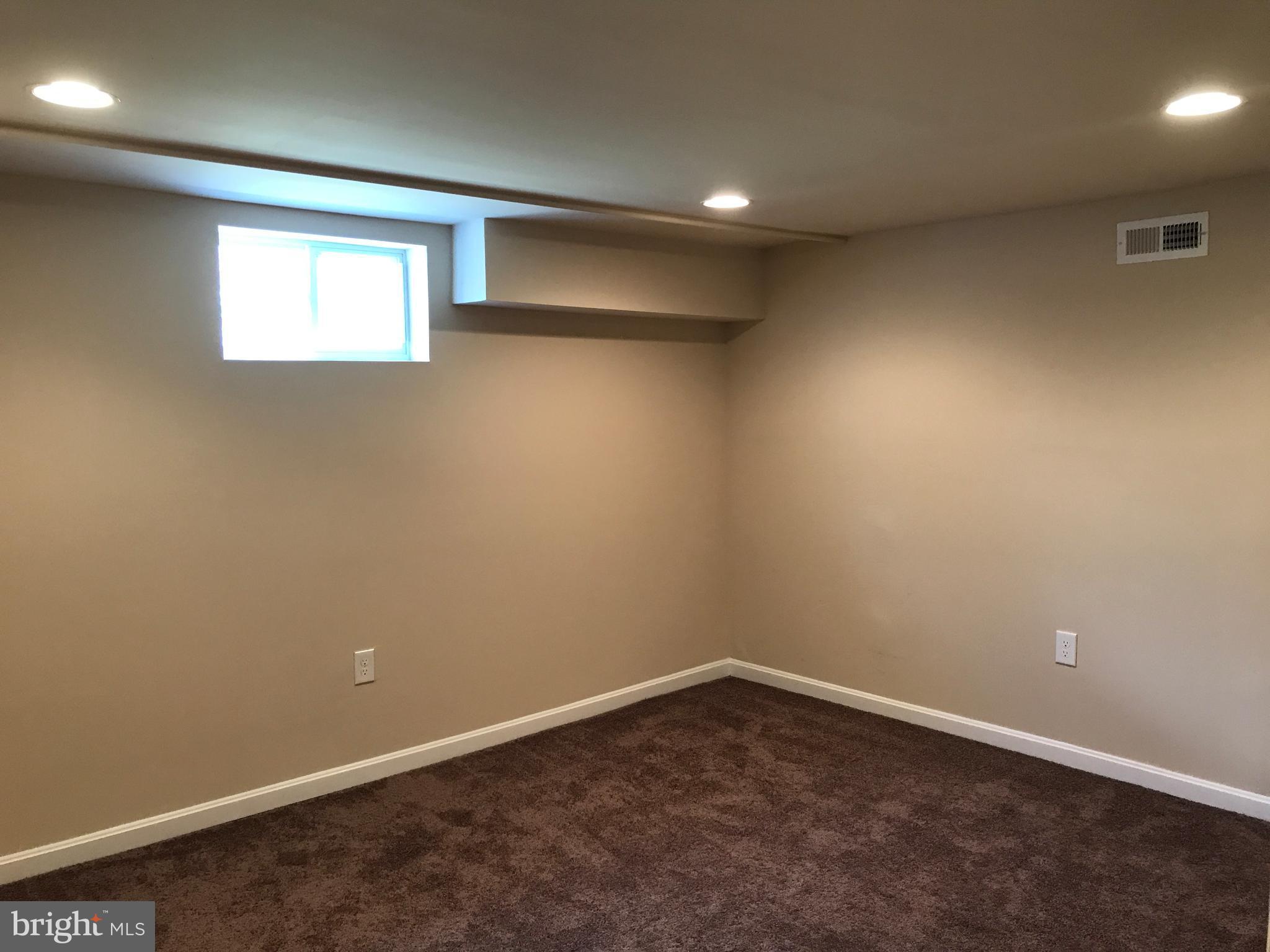 3905 Ridgecroft Road Baltimore, MD 21206 - Photo 18 of 30 Lower level Family Room or Bedroom 4