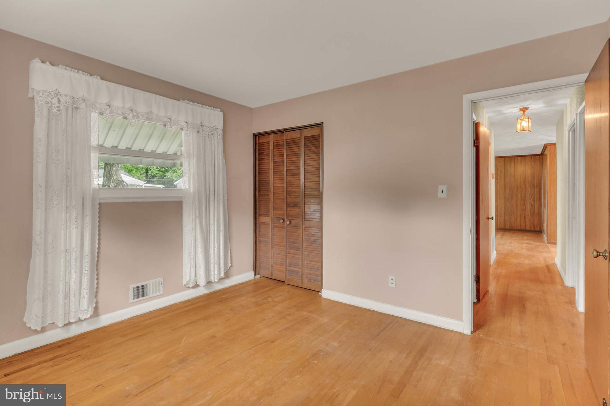 586 Rita Drive Odenton, MD 21113 - Photo 16 of 27 a view of an empty room with window and a bathroom