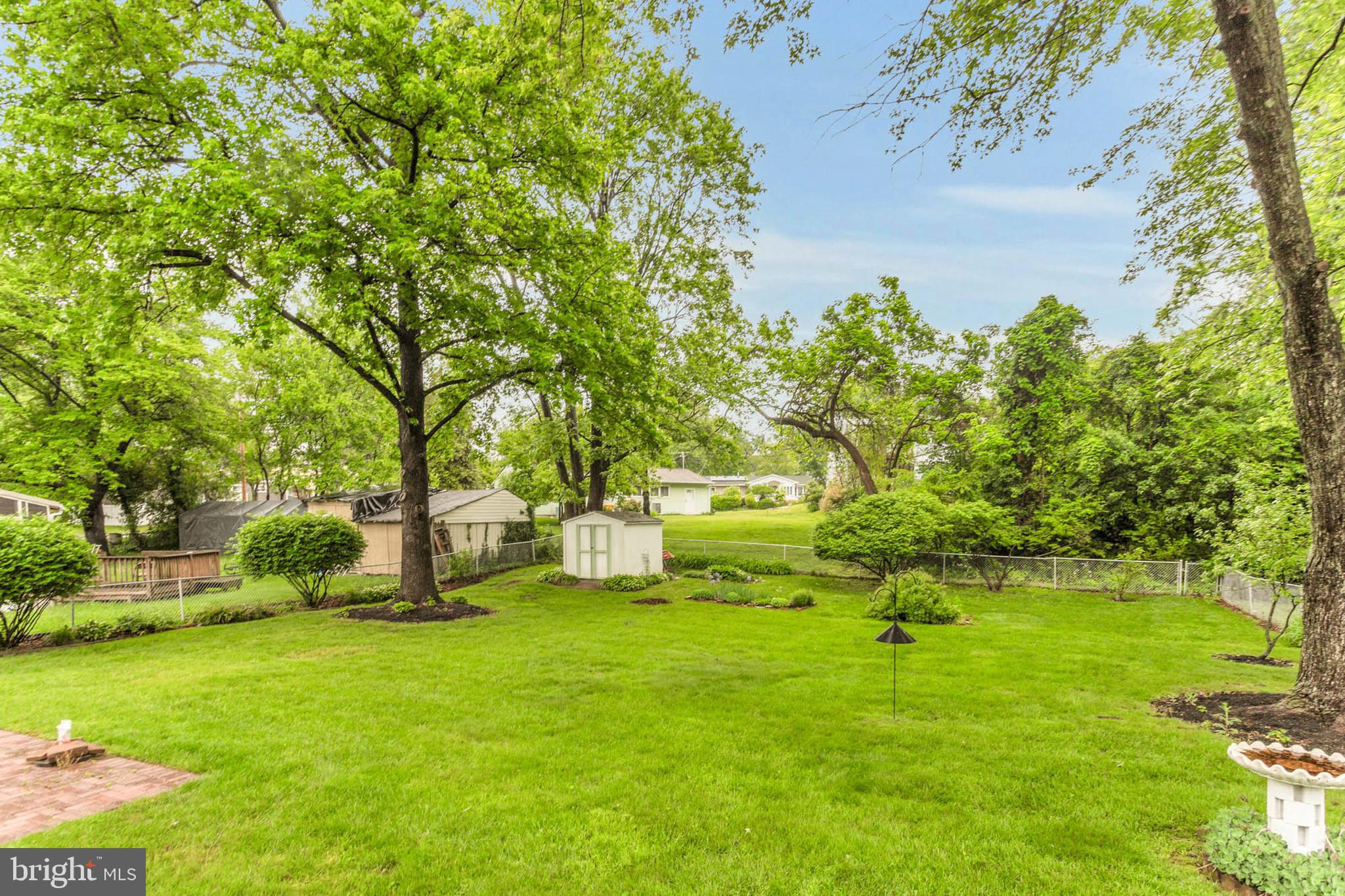 586 Rita Drive Odenton, MD 21113 - Photo 24 of 27 a view of backyard with swimming pool