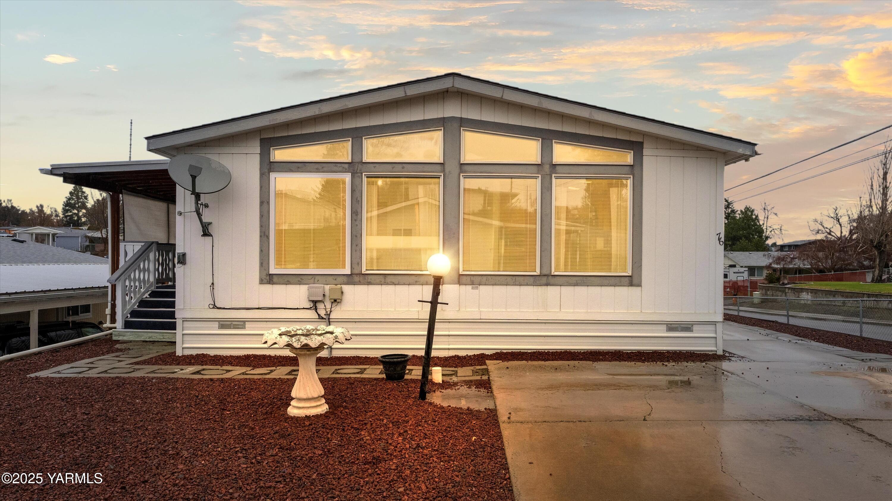 a view of a house with sitting area