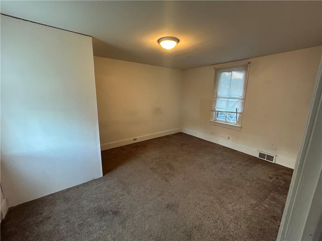 25 East Craig Street Uniontown, PA 15401 - Photo 7 of 18 an empty room with windows