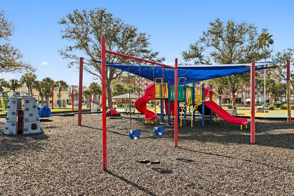 16332 Gulf Boulevard, Unit 3B Redington Beach, FL 33708 - Photo 88 of 91 a view of park with swings