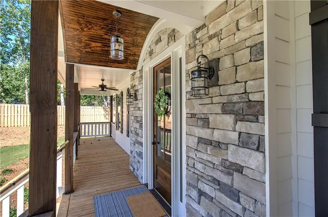 a view of an entryway with wooden floor