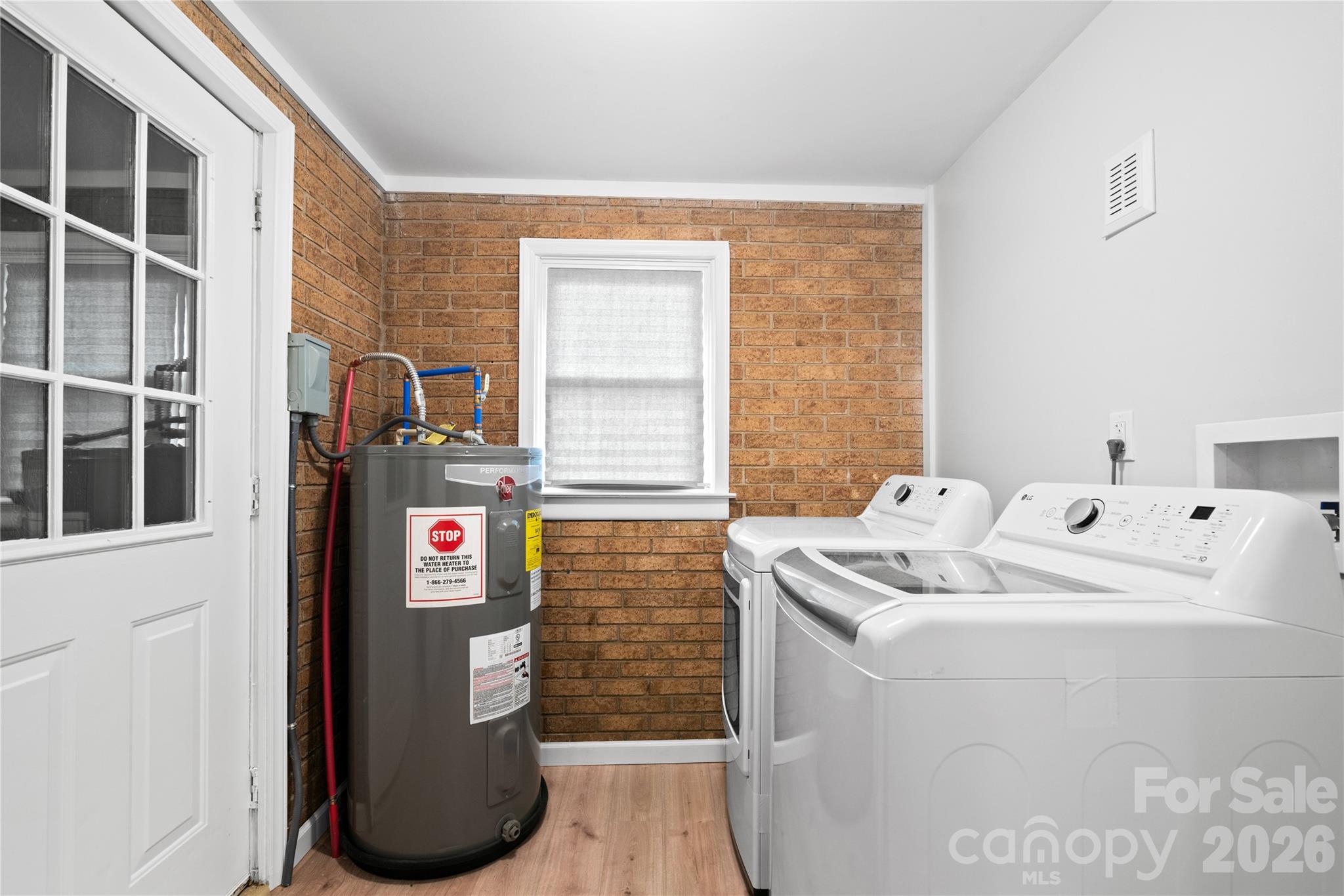 648 Scotts Creek Road Statesville, NC 28625 - Photo 8 of 17 a utility room with dryer and washer