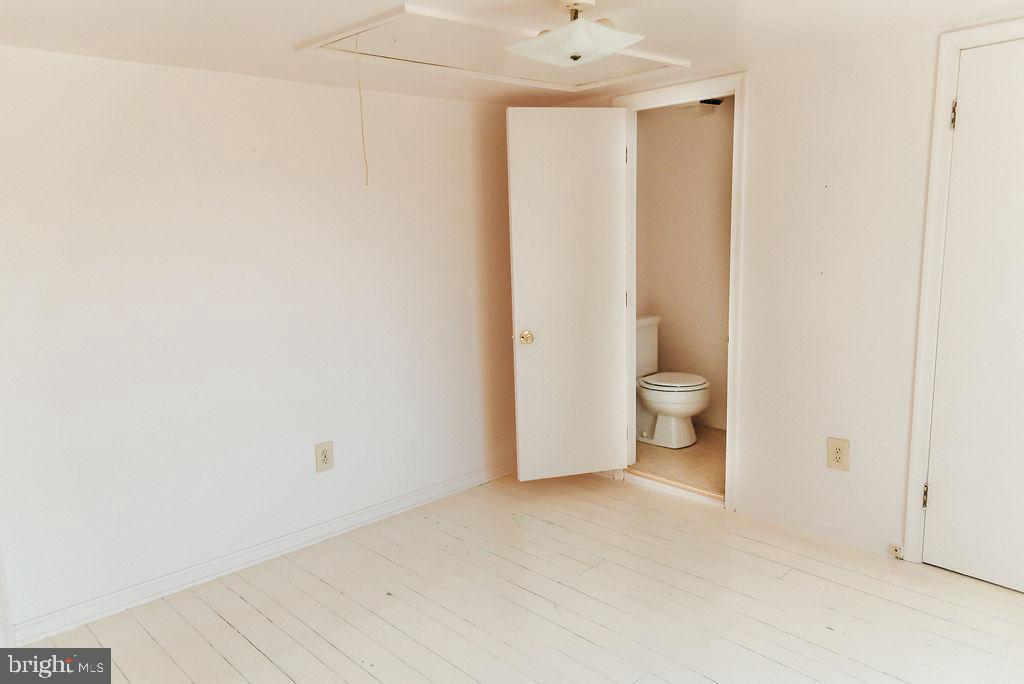 21128 Sparta Road Milford, VA 22514 - Photo 45 of 48 spare room with half bath 2nd level