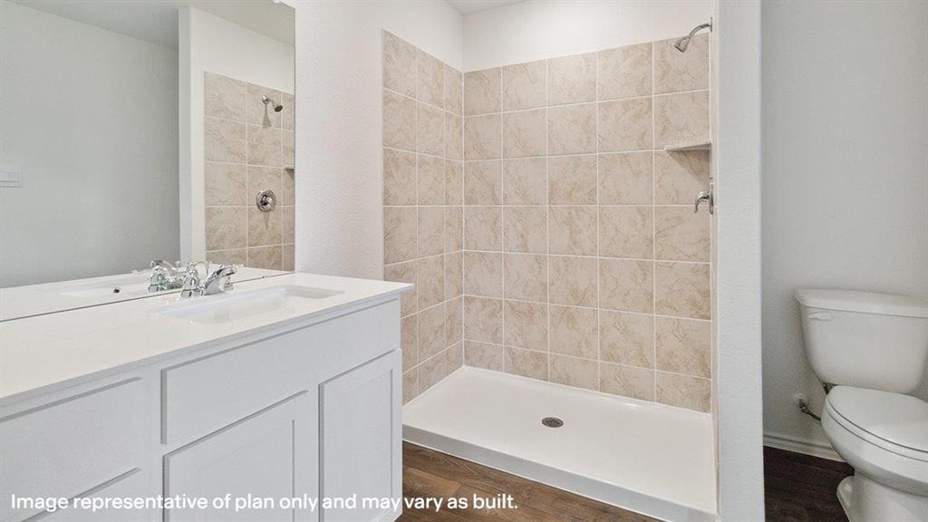 1824 Potomac Lane Blue Ridge, TX 75424 - Photo 19 of 29 a bathroom with a sink a toilet and shower