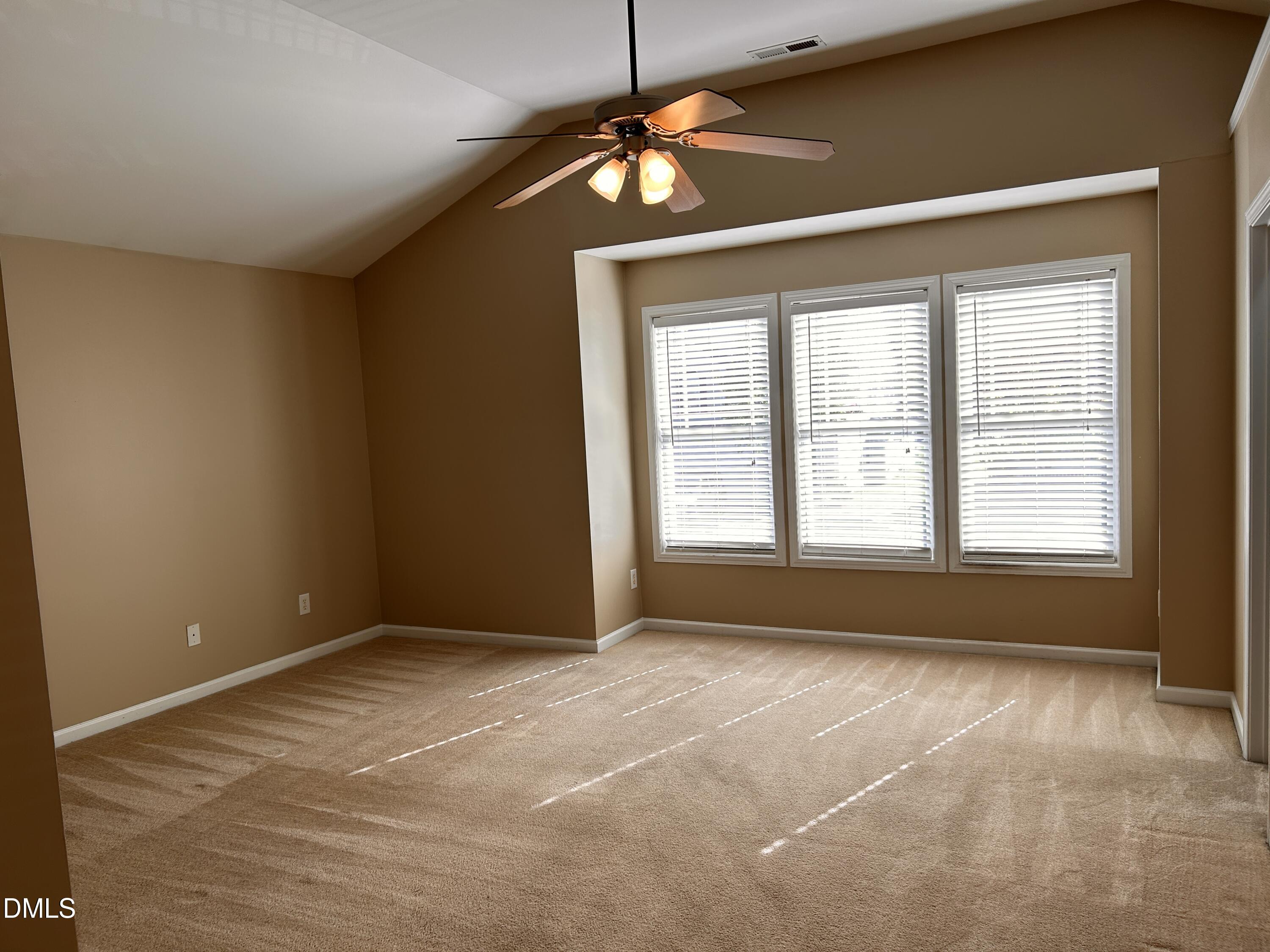 3920 Cane Garden Drive Raleigh, NC 27610 - Photo 13 of 23 a view of an empty room with a window