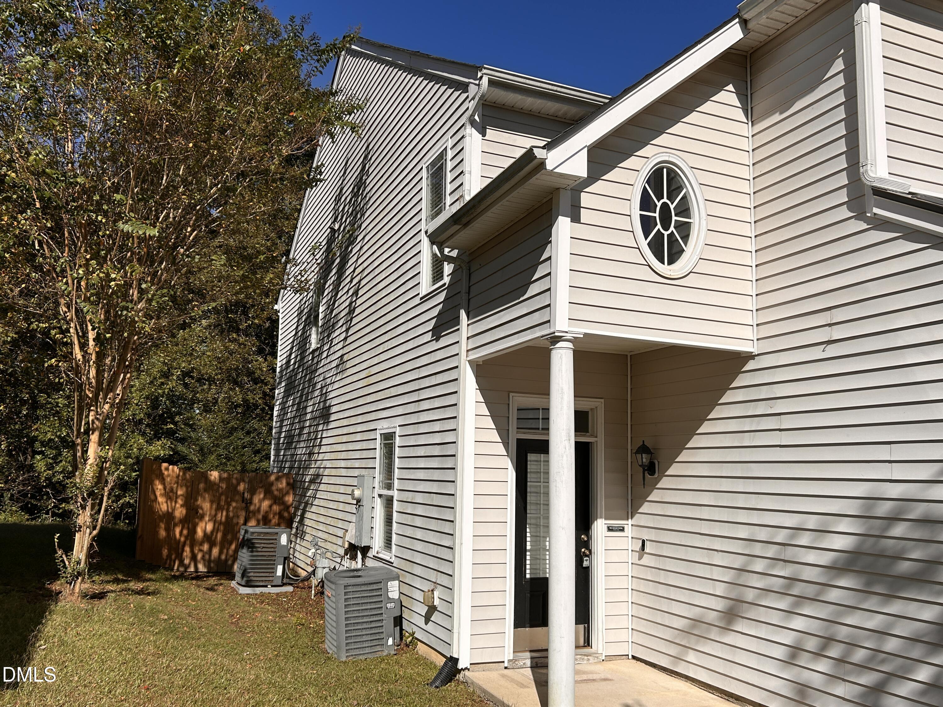 3920 Cane Garden Drive Raleigh, NC 27610 - Photo 22 of 23 a view of a house with a garage