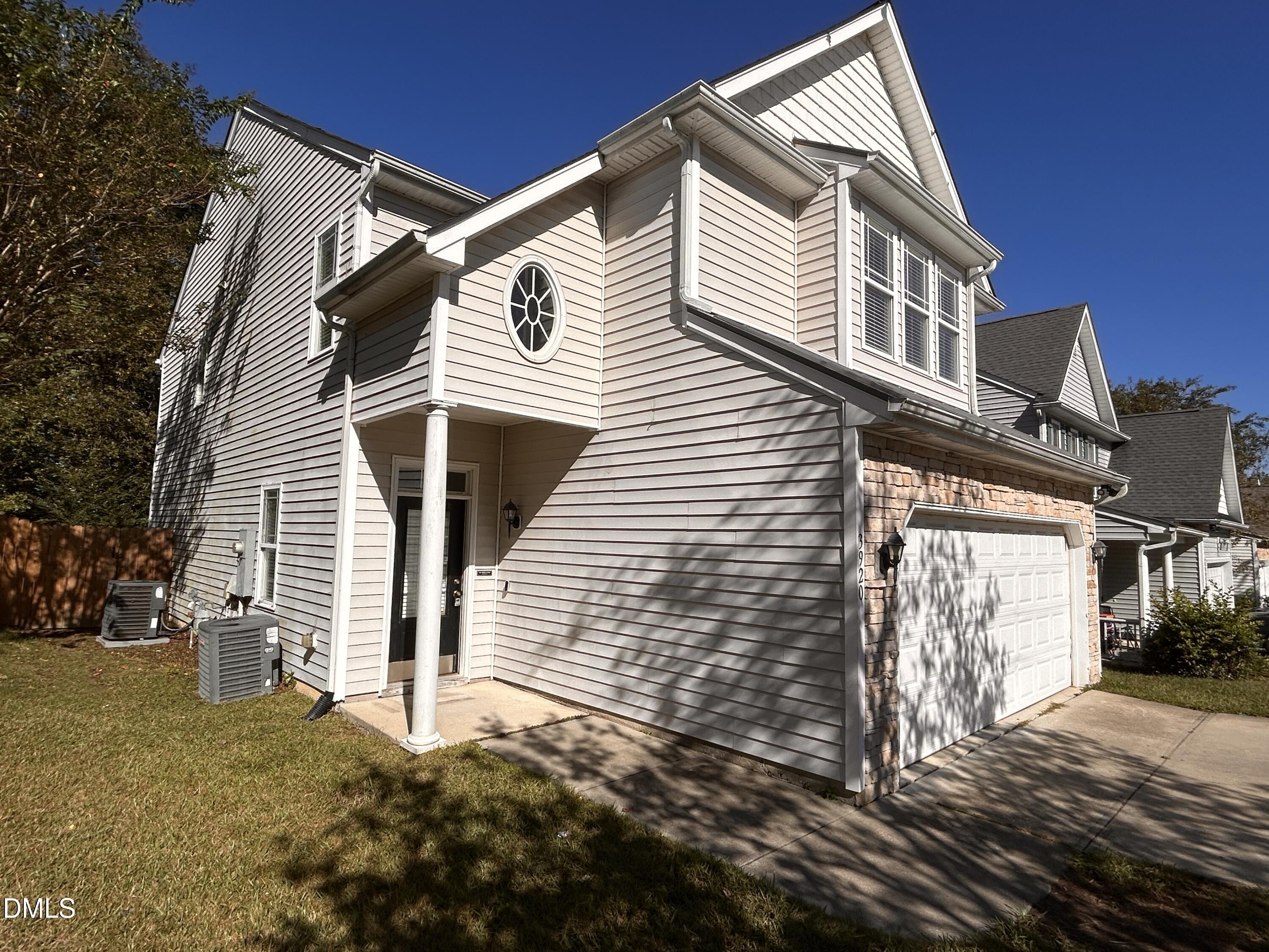 3920 Cane Garden Drive Raleigh, NC 27610 - Photo 3 of 23 a view of a house with a yard
