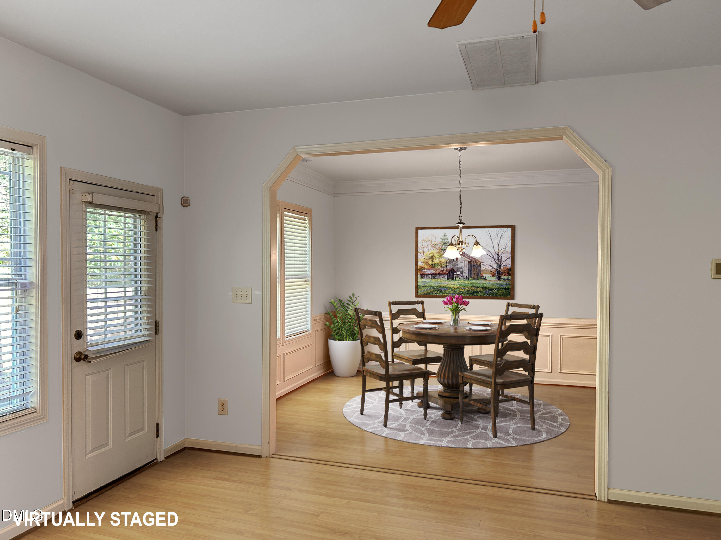 3920 Cane Garden Drive Raleigh, NC 27610 - Photo 5 of 23 a view of a dining room with furniture and chandelier