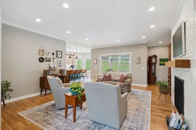 a kitchen with a sink a stove and a refrigerator