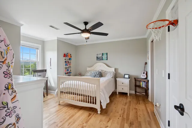 a balcony with table and chairs