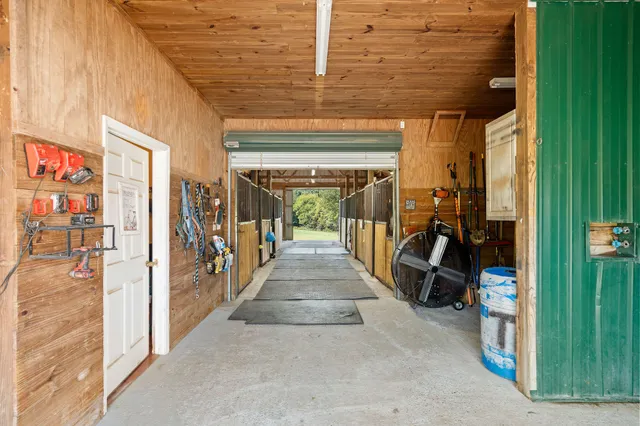 a view of a swimming pool with a yard