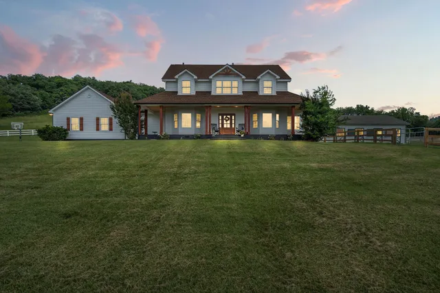 a house view with outdoor seating space