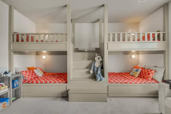 a bathroom with a sink a toilet a shower and a mirror