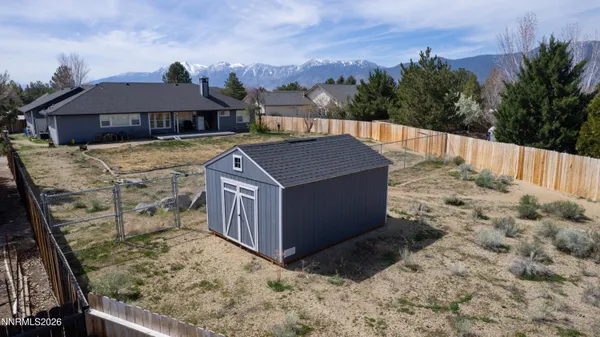 a backyard of a house with an outdoor space