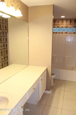a bathroom with a bathtub