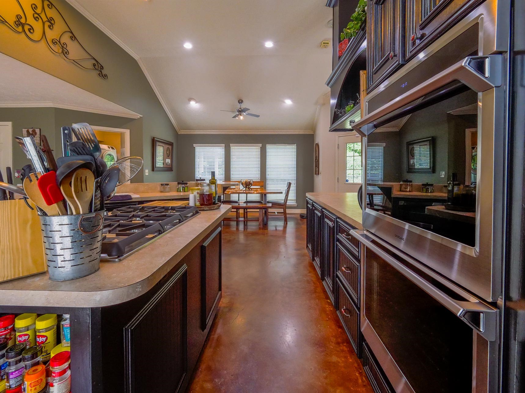 202 Jack White Road Livingston, TX 77351 - Photo 16 of 20 a kitchen with stainless steel appliances granite countertop a stove and a refrigerator