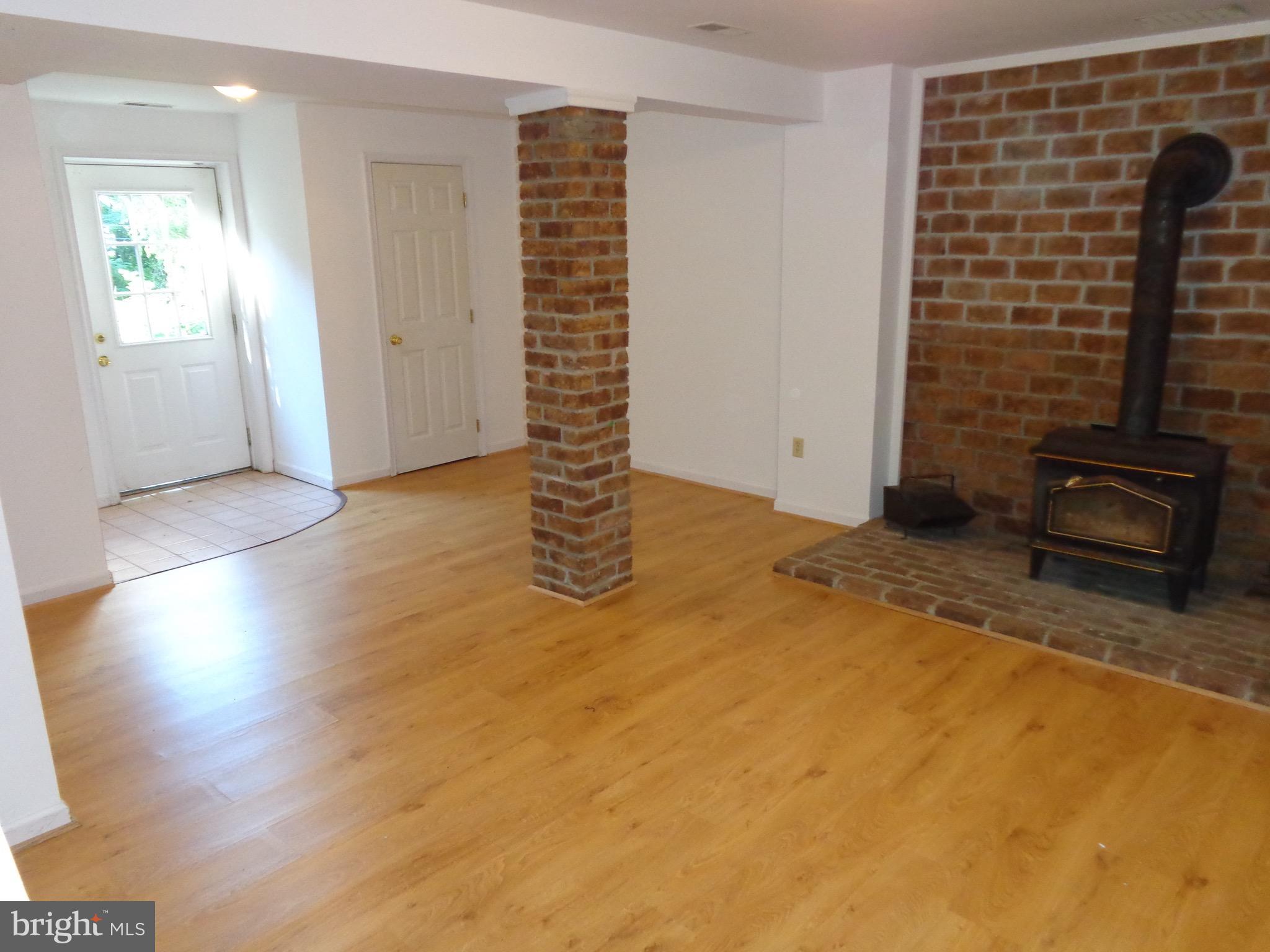 88 Long View Road Linden, VA 22642 - Photo 21 of 30 Family Room with brick hearth and wood stove