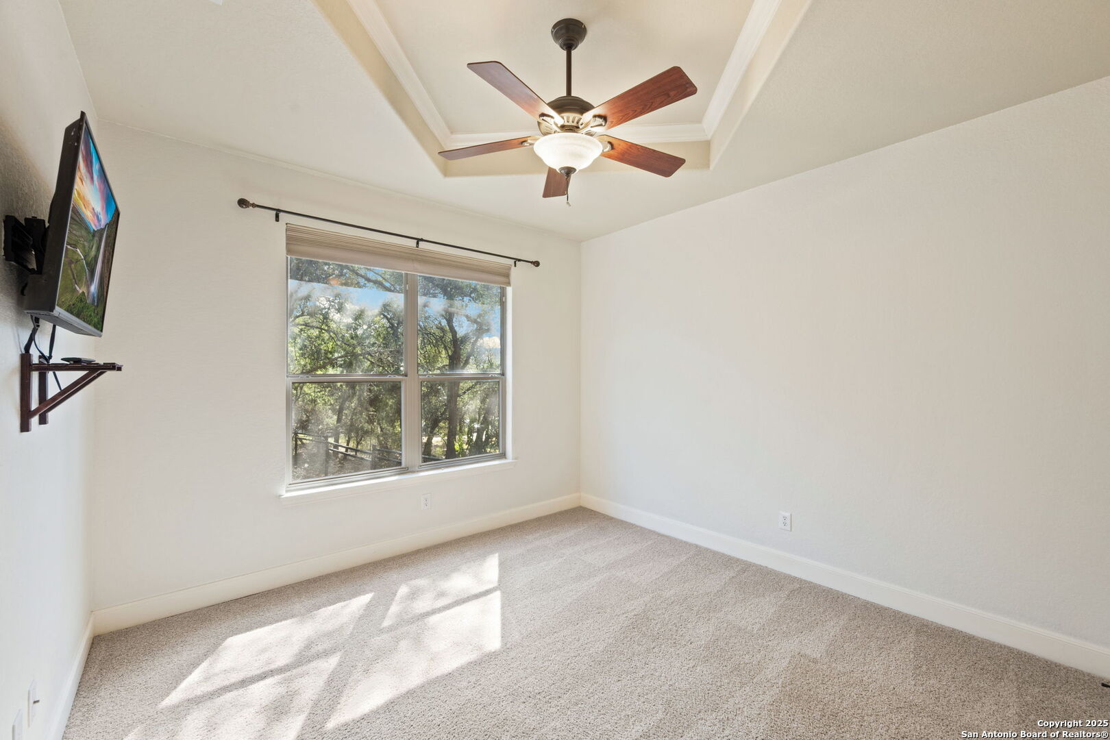 3015 River Way Spring Branch, TX 78070 - Photo 30 of 44 a view of a livingroom with a ceiling fan and window