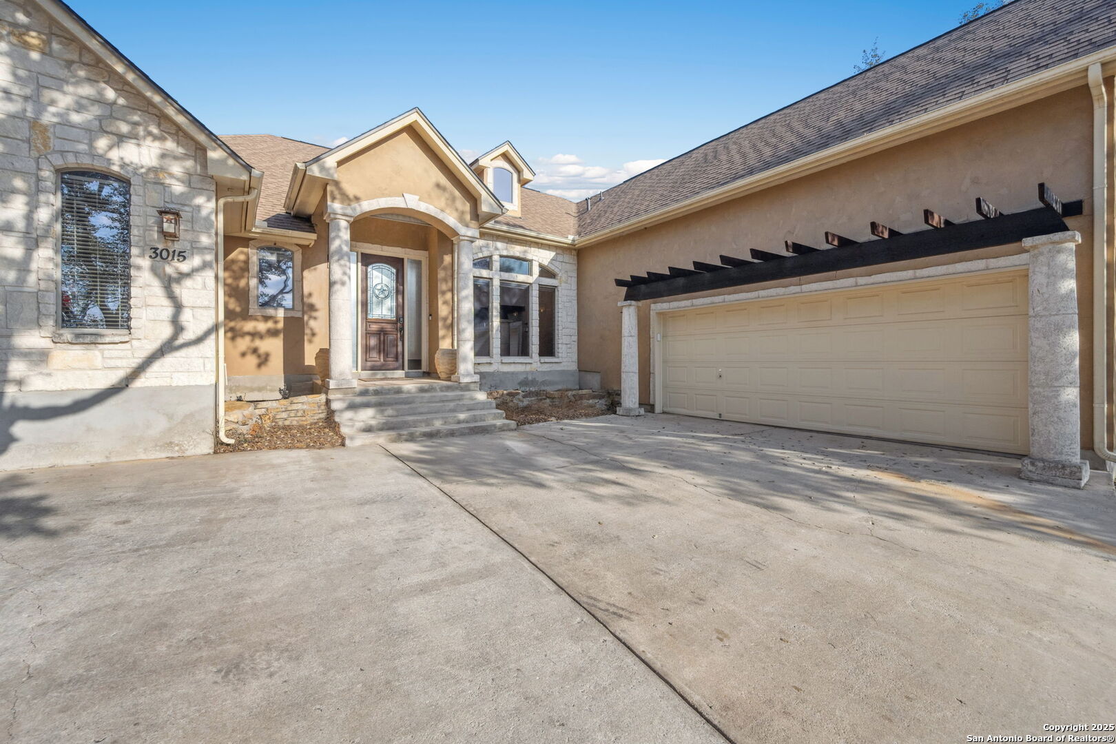 3015 River Way Spring Branch, TX 78070 - Photo 3 of 44 a view of a house with a garage