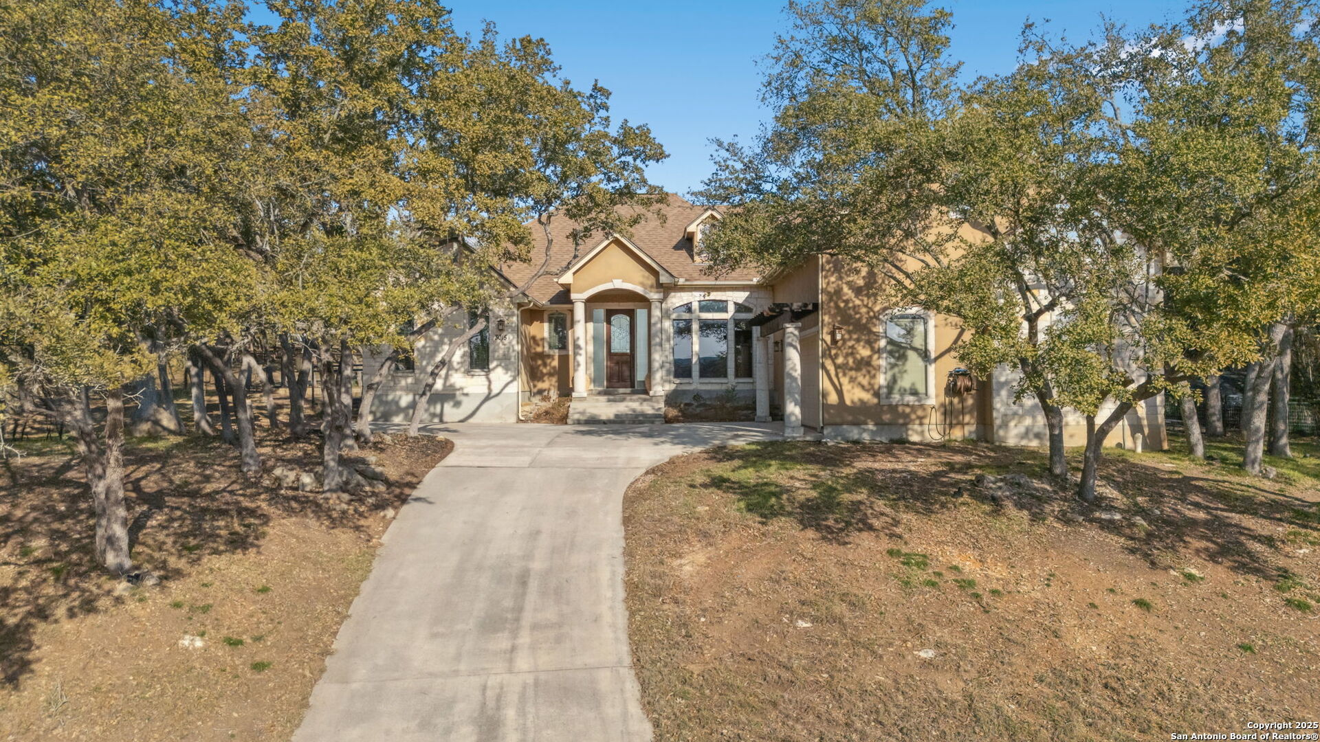 3015 River Way Spring Branch, TX 78070 - Photo 42 of 44 a front view of a house with a yard