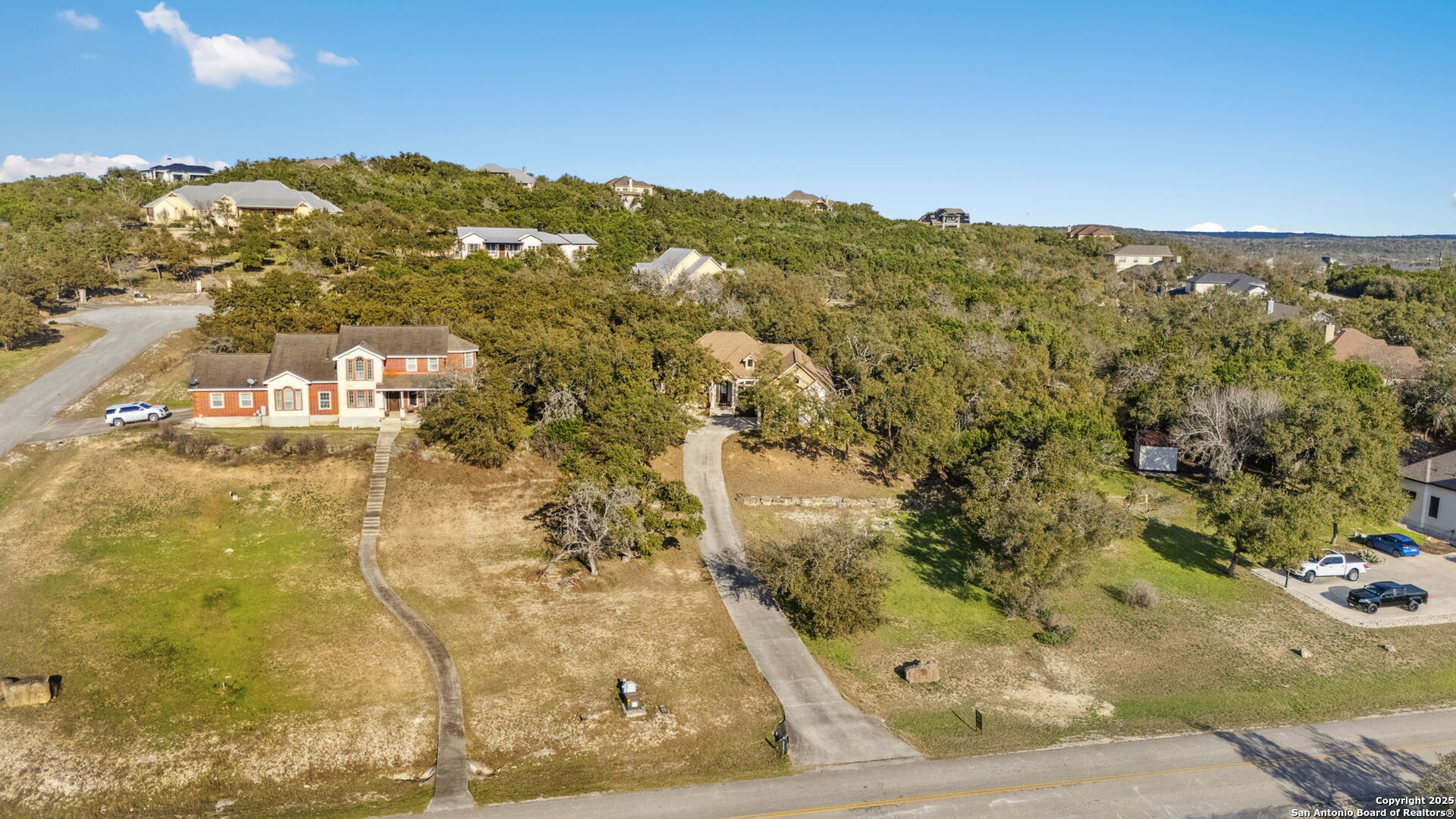 3015 River Way Spring Branch, TX 78070 - Photo 43 of 44 a view of residential houses with swimming pool