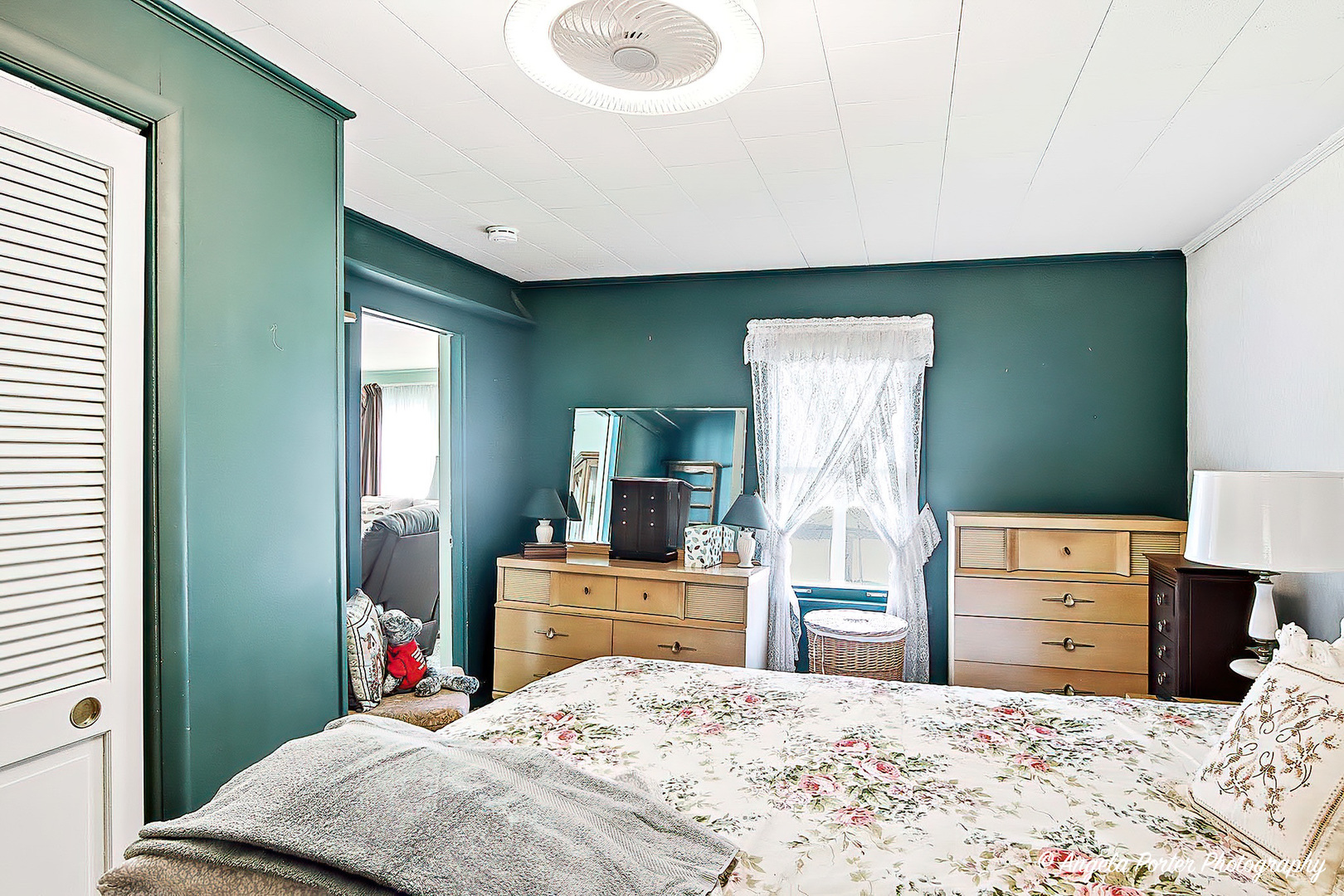 814 North River Road McHenry, IL 60051 - Photo 14 of 39 a bed room with a bed and a television