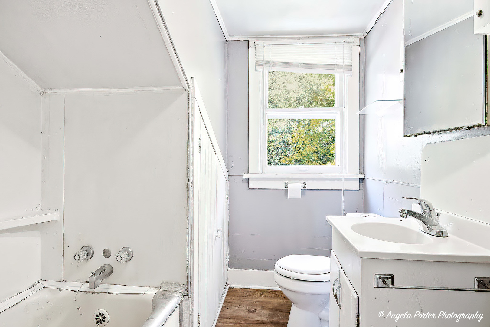 814 North River Road McHenry, IL 60051 - Photo 29 of 39 a bathroom with a sink toilet and a mirror