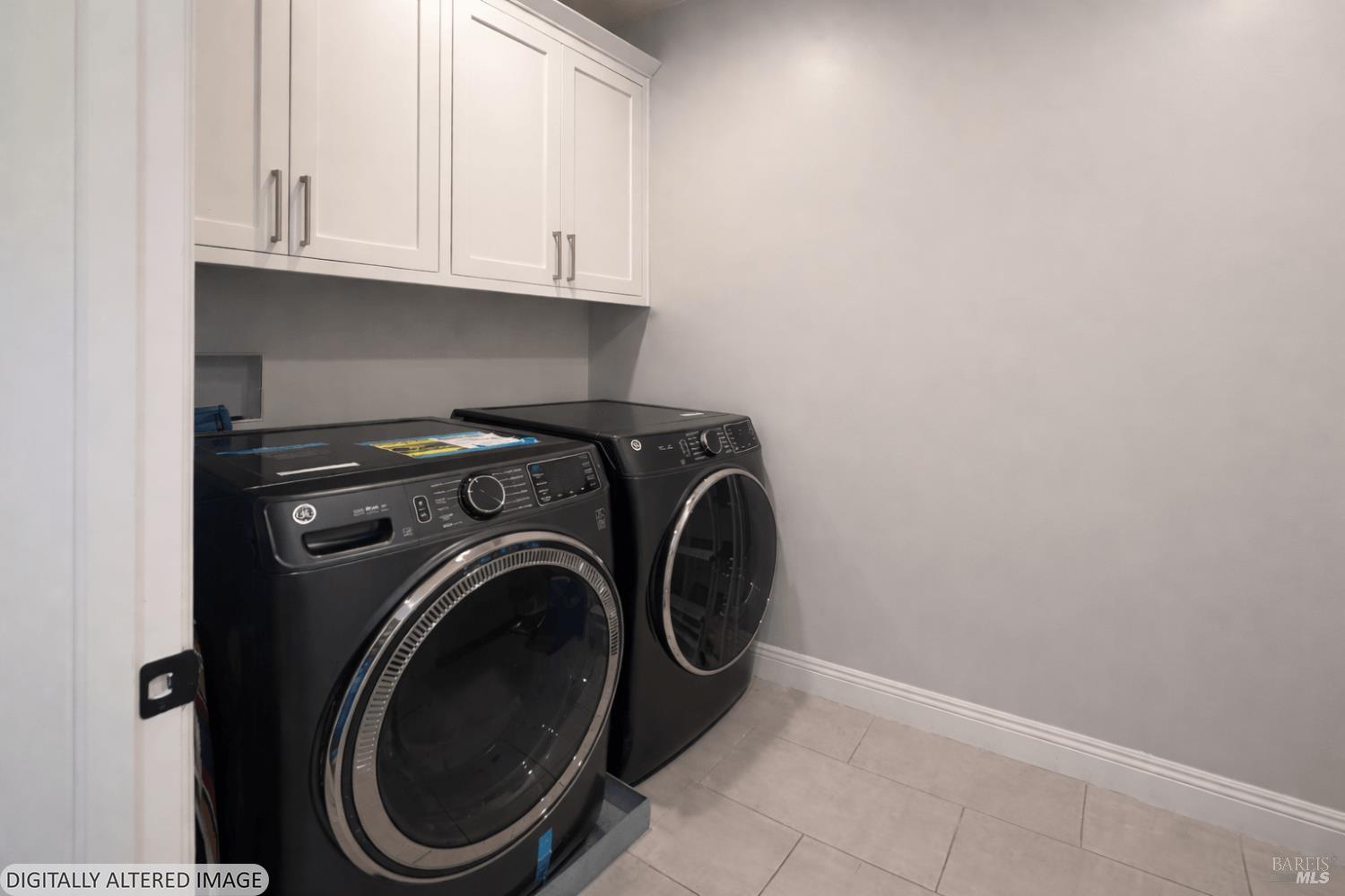 3726 Cannes Place Santa Rosa, CA 95403 - Photo 63 of 69 Upper-level laundry room. The owners are including the washer and dryer in the sale of this home. Tile flooring and upper cabinets for additional storage.