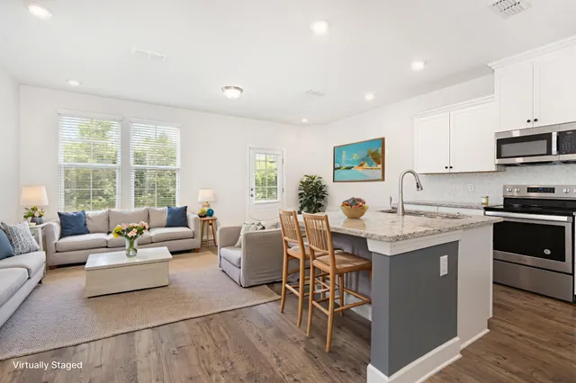 a front view of a house with a garage