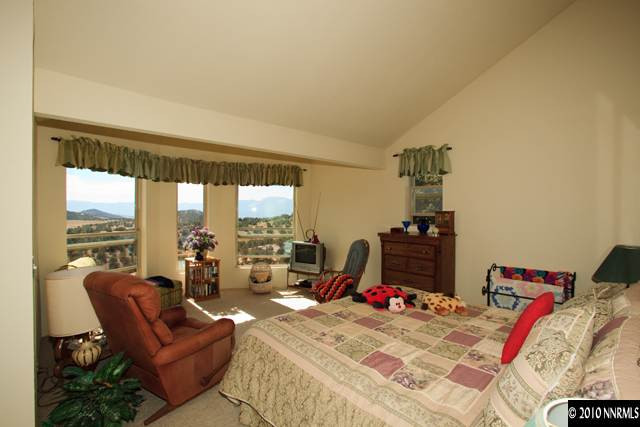 1991 Saddleback Road Reno, NV 89521 - Photo 7 of 13 a living room with furniture and a floor to ceiling window