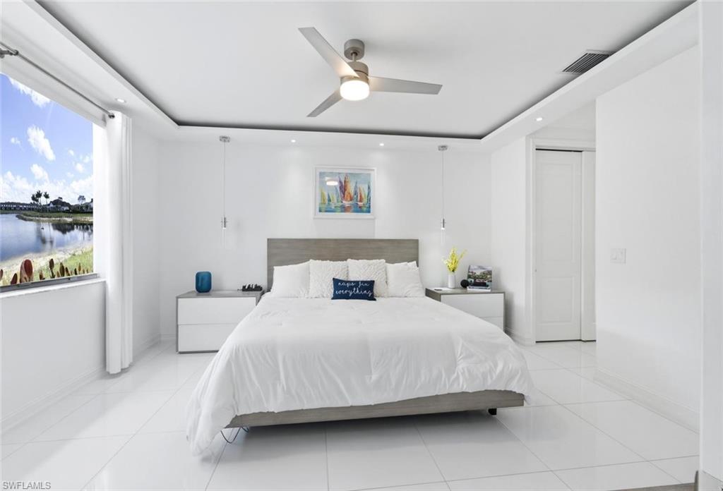 7345 Rockefeller Drive Naples, FL 34119 - Photo 19 of 42 Master Bedroom