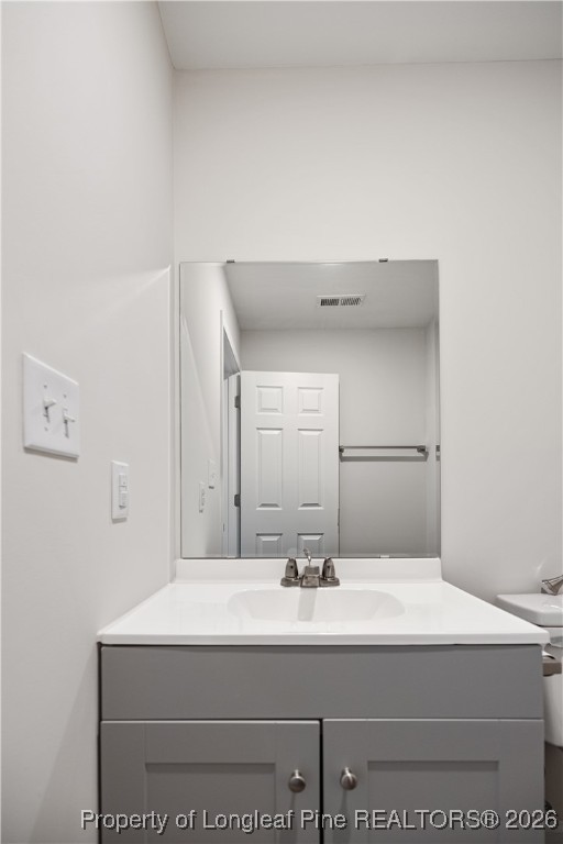 804 Porter Road Hope Mills, NC 28348 - Photo 33 of 42 a bathroom with a sink and a mirror