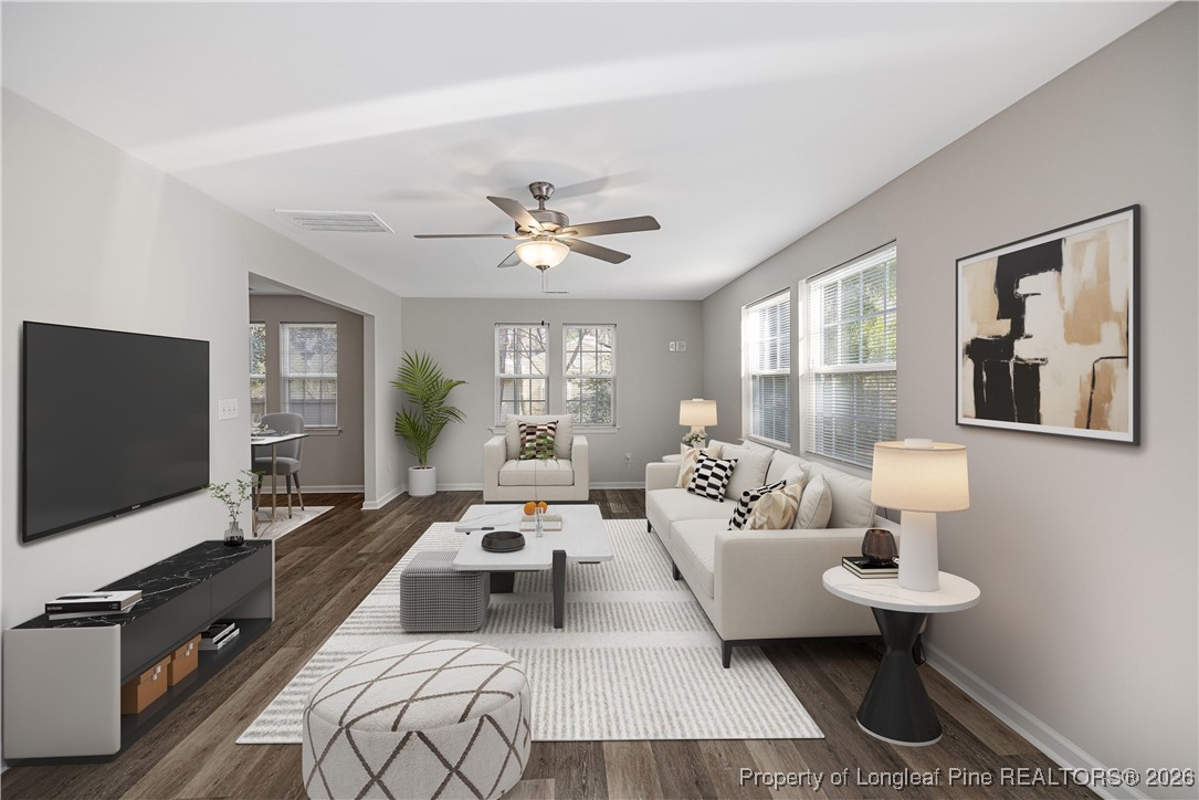 804 Porter Road Hope Mills, NC 28348 - Photo 5 of 42 a living room with furniture and a flat screen tv