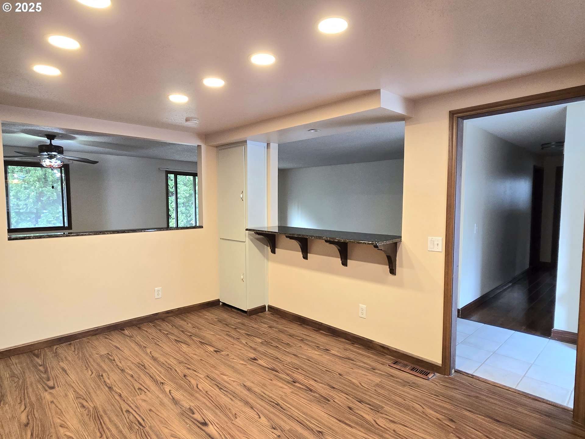 20675 Southwest Rosa Drive Beaverton, OR 97078 - Photo 10 of 40 a view of a living room with hardwood floor