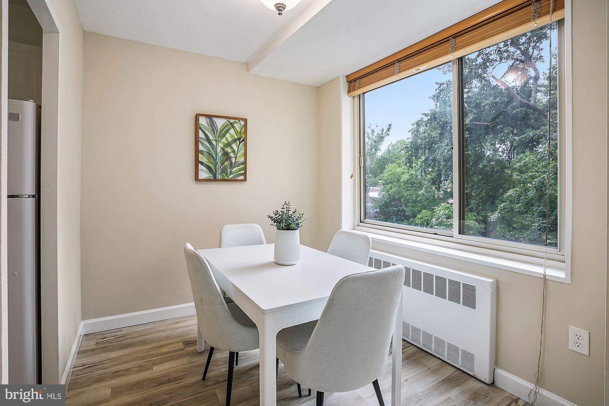 4000 Tunlaw Road Northwest, Unit 418 Washington, DC 20007 - Photo 7 of 40 Dining Area with Treetop Views