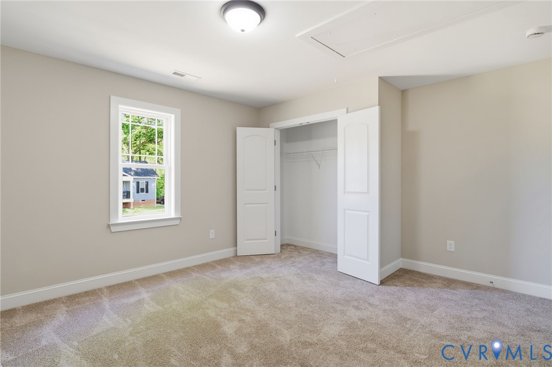 17557 Hewlett Road Beaverdam, VA 23015 - Photo 19 of 29 an empty room with windows