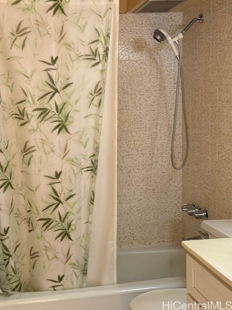 98-707 Iho Place, Unit 1004 Aiea, HI 96701 - Photo 11 of 20 a bathroom with a bathtub and shower