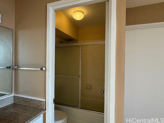 98-707 Iho Place, Unit 1004 Aiea, HI 96701 - Photo 13 of 20 a bathroom with a mirror