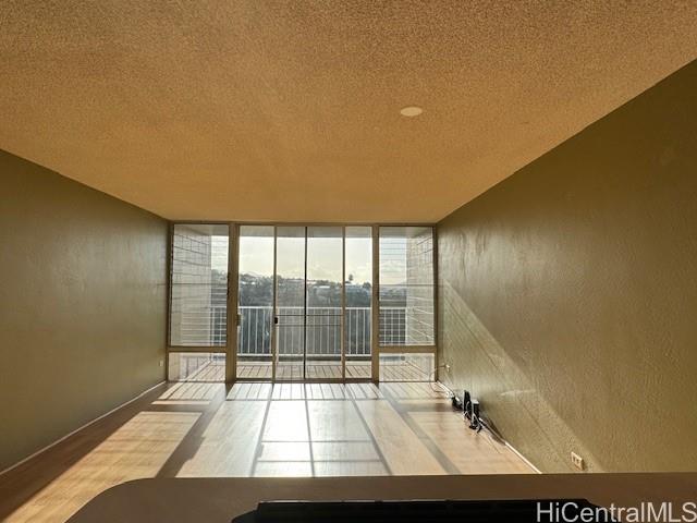 98-707 Iho Place, Unit 1004 Aiea, HI 96701 - Photo 2 of 20 a view of an empty room