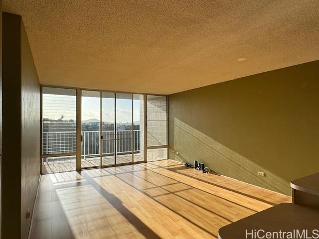 98-707 Iho Place, Unit 1004 Aiea, HI 96701 - Photo 3 of 20 a view of a tennis court