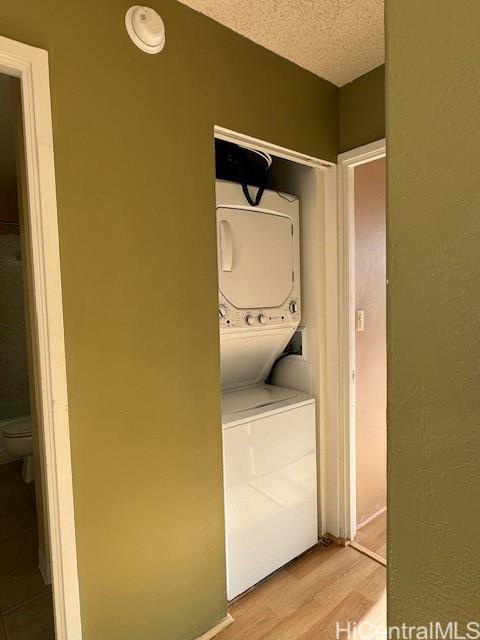 98-707 Iho Place, Unit 1004 Aiea, HI 96701 - Photo 7 of 20 a utility room with a washer and dryer